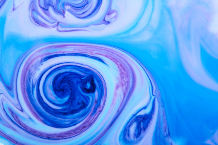 Blue and pink abstract space meditative art paint stains backgroundの写真素材