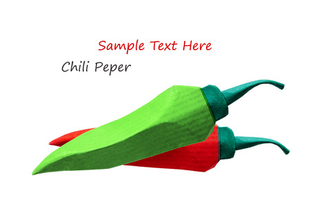 Origami paper red and green chili pepper hot on a blue backgroundの写真素材