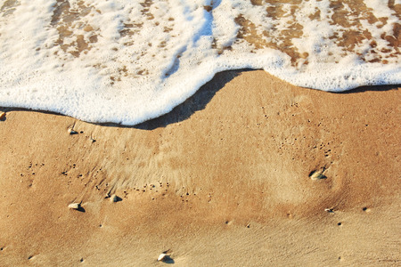 Sand beach with blue wave blank backgroundの写真素材