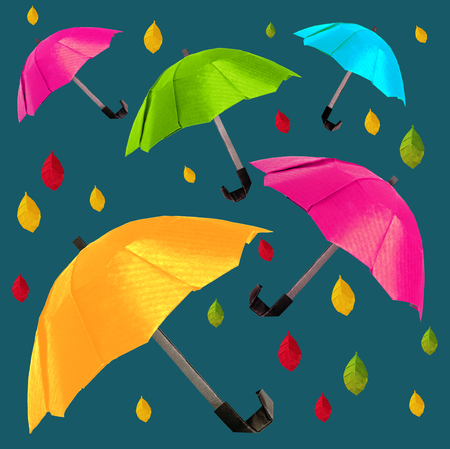 Origami red protection umbrella on a white backgroundの写真素材
