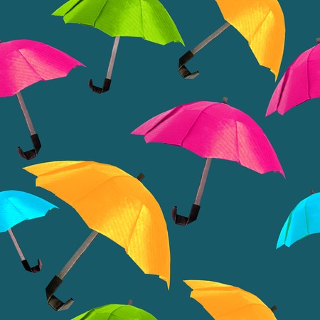 Origami red protection umbrella on a white backgroundの写真素材