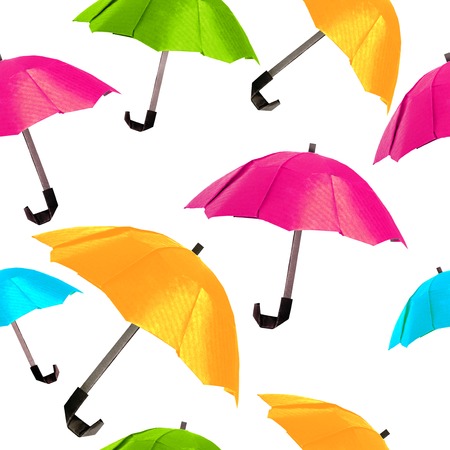 Origami red protection umbrella on a white backgroundの写真素材