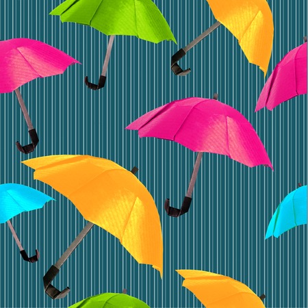 Origami red protection umbrella on a white backgroundの写真素材