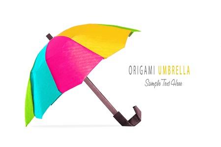 Origami red protection umbrella on a white backgroundの写真素材