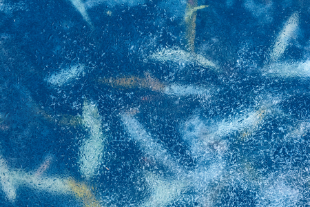 Textured ice blue cold frozen winter backgroundの写真素材