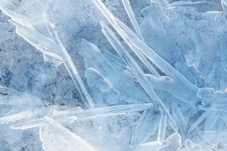 Textured ice blue cold frozen winter backgroundの写真素材