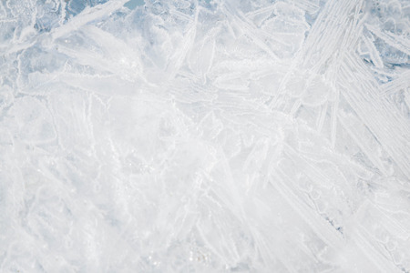 Textured ice white cold frozen winter backgroundの写真素材