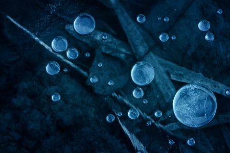 Abstract frozen cold dark frost fantasy bubbles backgroundの写真素材