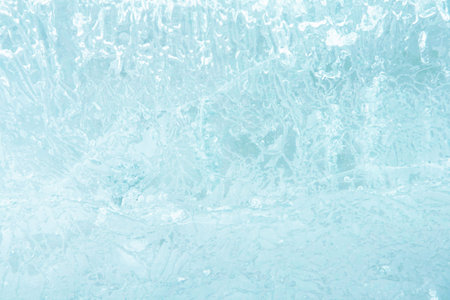 Textured ice blue crystal arctic cold frozen winter backgroundの写真素材