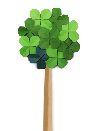 Origami paper tree on a white backgroundの写真素材