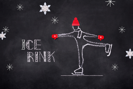 Chelk sketch of child skating on ice rink, Hand drawn illustration on black boardの写真素材