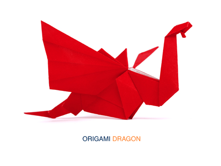 Origami red paper dragonの写真素材