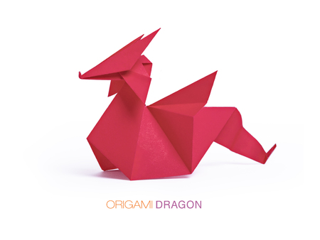 Origami red paper dragonの写真素材