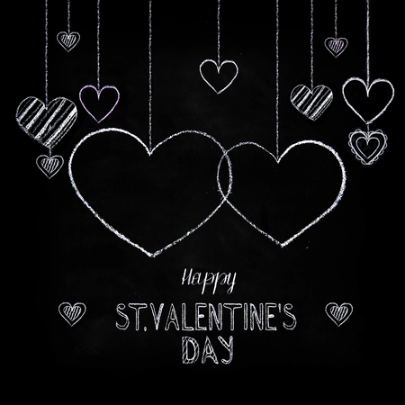 Hand drawn chalk lettering - Valentine's Day - on chalkboard. Hand painted text.の写真素材