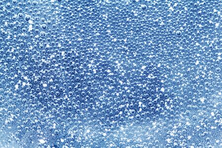 Water bubbles in mineral pure water backgroundの写真素材