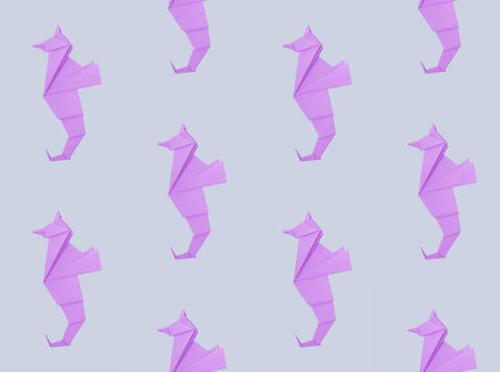 Abstract origami sea horse isolated on a gray backgrounds pattern