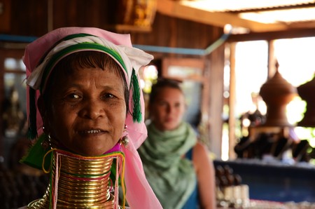 Ticking, MYANMAR - FEBRUARY 26: A close-up of a Long Neck woman on February, 26, 2015 in Inle Lake, Myanmarのeditorial素材