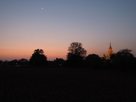 Sunset in Bagan, golden temple in the backgroundの写真素材