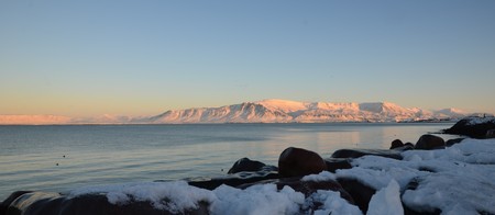 Coast of Atlantic Ocean Reykjavik Iceland during sunriseの写真素材