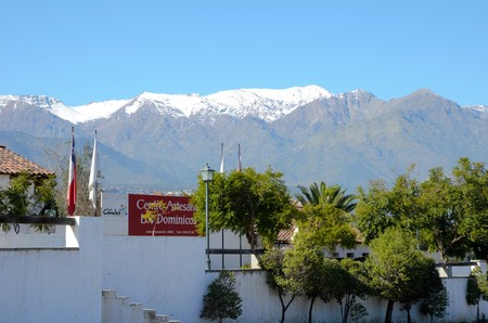 Long shot of the entrance to the craft market in Los Dominicos in Santiago de Chile with the Andes in the background in Chile, South Americaのeditorial素材