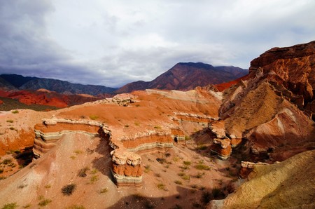 Impressions of the Canyon Quebrada de las Conchas with walls of rock displaying layers with several different colors close to Cafayate in Chile, South Americaの写真素材