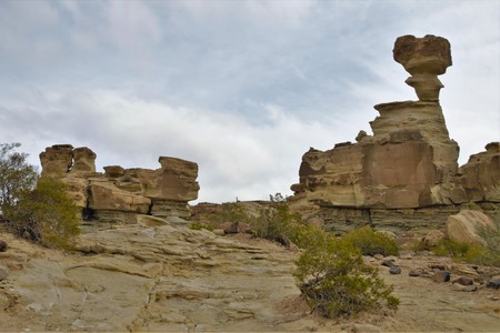 Long shot of the stone formation the submarine in the nature reserve Ischigualasto also called Valle de la Luna in the area San Juan in Argentina, South Americaの写真素材