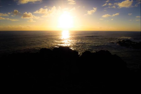 Long shot of the Moai during sunset at Ahu Tahai in Hanga Roa in Rapa Nui, Easter Island, Chile, South Americaの写真素材