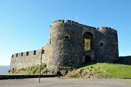 Long shot of Carrickfergus Castle, a Norman Irish castle in Northern Ireland in the County Antrim, on the northern shore of Belfast Loughのeditorial素材