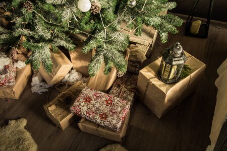 Gifts near pine tree on Christmasの写真素材