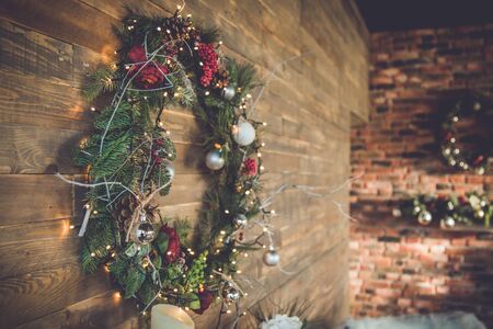 Oval garland sideview on wall with decoration on christmasの写真素材