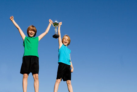 kids winning sports cupの写真素材
