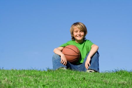 happy child with basketballの写真素材