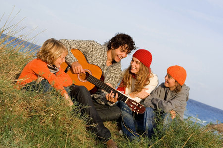 happy family with guitar