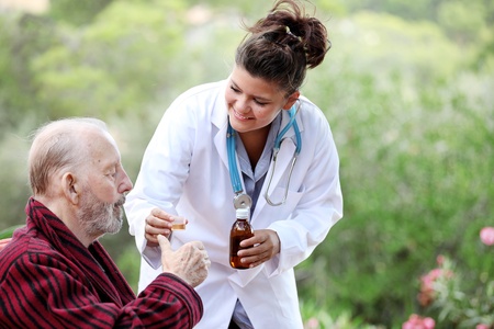 senior man with doctor or nurse の写真素材