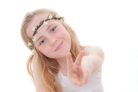 young child doing v or victory sign for success or winner.の写真素材