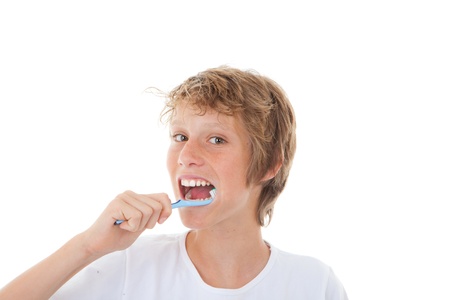 healthy child cleaning teeth with tooth brushの写真素材