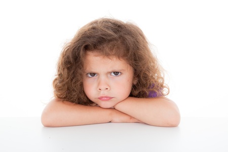 sulky angry young girl child, sulking and pouting,の写真素材