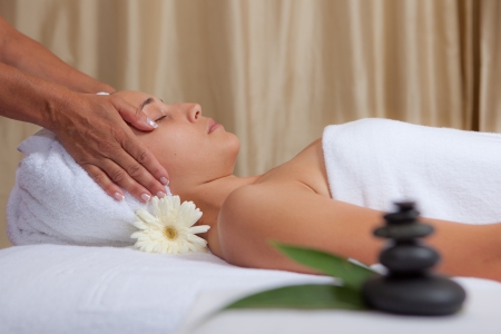 relaxation, woman getting relaxing spa head massageの写真素材