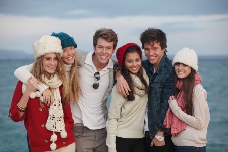 happy group of winter autumn teensの写真素材