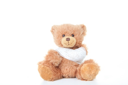 accident concept teddy with bandageの写真素材