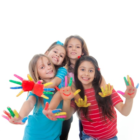 group of happy children having fun with paint