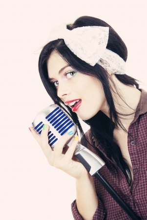 woman performer singing karaokeの写真素材