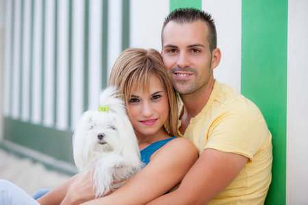 couple with pet dog