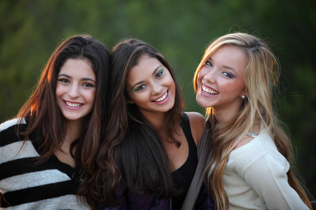 smiling teens with beautiful white teethの写真素材