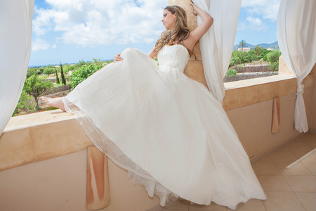 woman wearing bride or graduation dress の写真素材