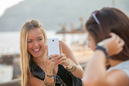 teens taking summer vacation photosの写真素材