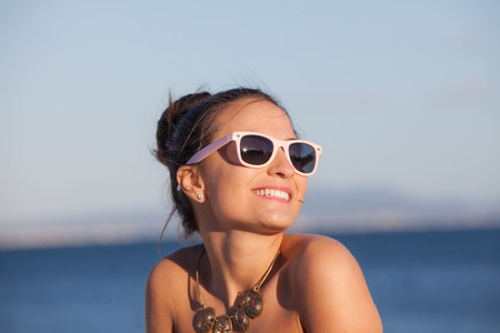 happy woman on summer beach vacationの写真素材
