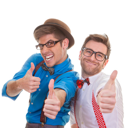 humour, successful business men with thumbs up for successの写真素材