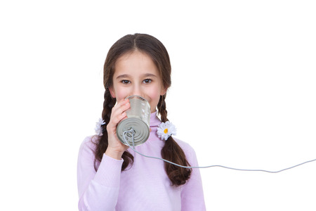 communication concept child with tin can and string telephoneの写真素材