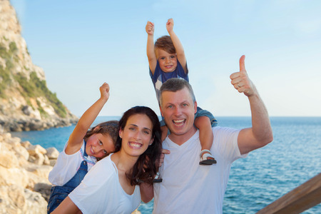 family on summer vacation, mum dad and childrenの写真素材